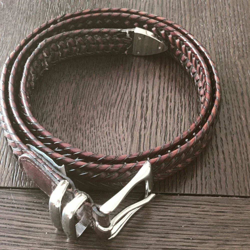Leather Belt by Perry Ellis in a woven design with a belt buckle in Silver